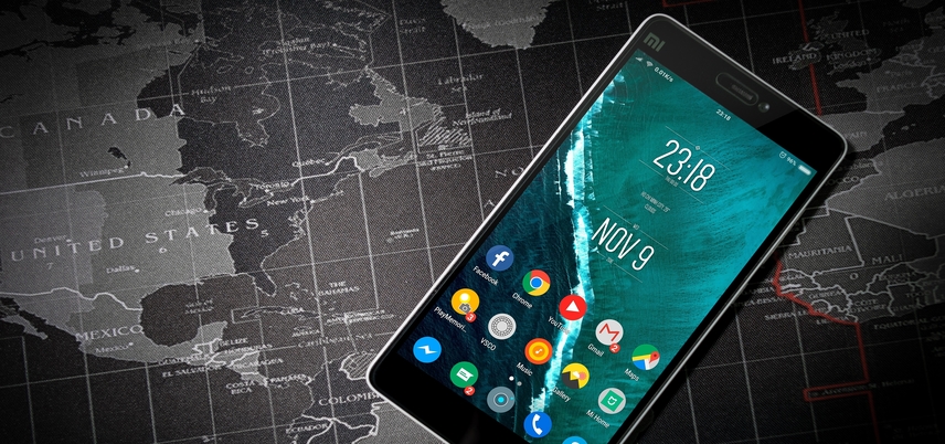 smartphone on a map of the world
