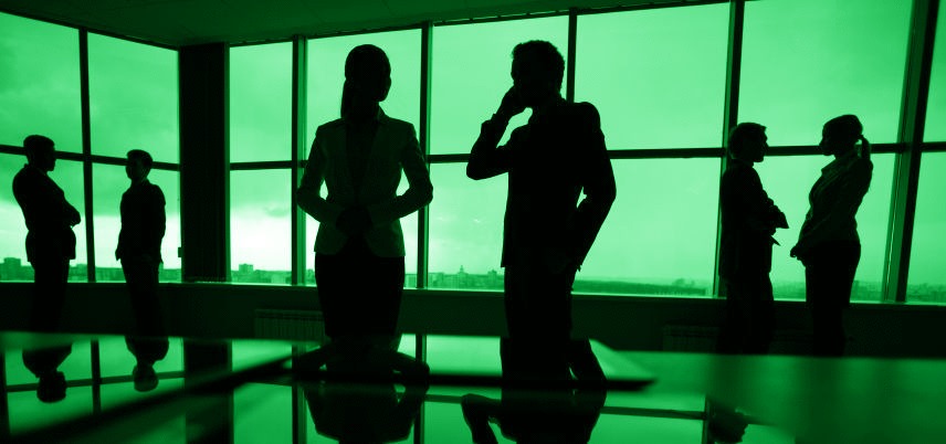 office worker silhouettes, green tint