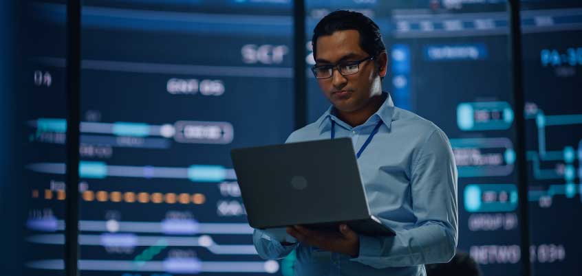 Man holding laptop