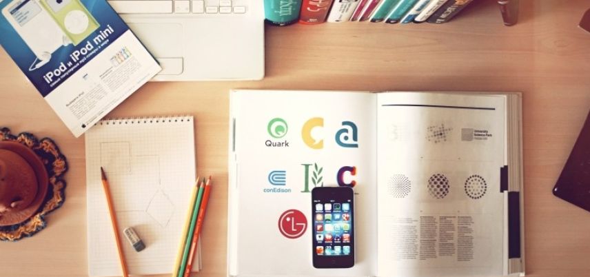 aerial-view-of-laptop-books-mobile-phone-and-books