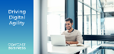 Driving Digital Agility headline with photo of man working on laptop at desk.