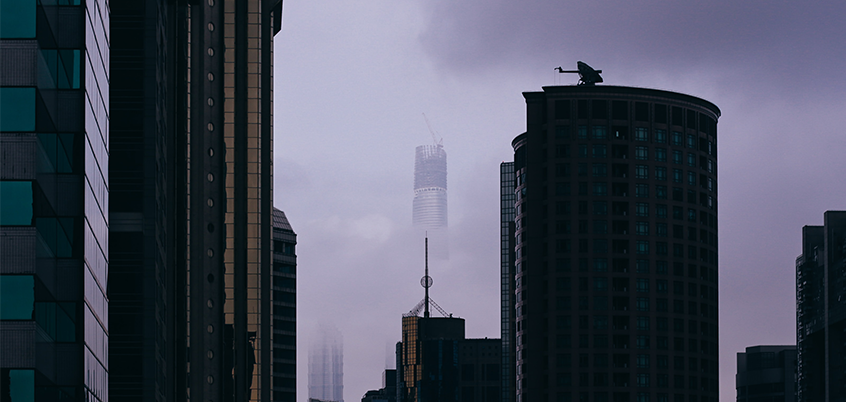 Skyscrapers obscured by clouds