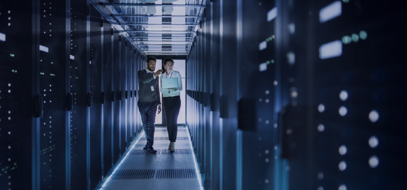 Man and woman in server room.