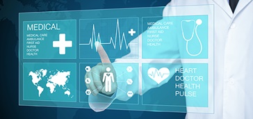 comcast_brief_foundation-healthcare_image_800x375 medical icons on a touchscreen