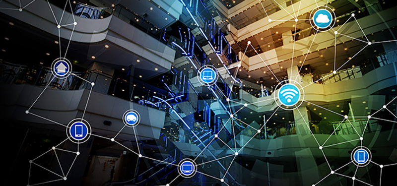 digital network graphic over hotel atrium interior