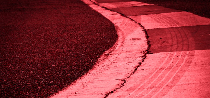 curved part of a racetrack, pink tint