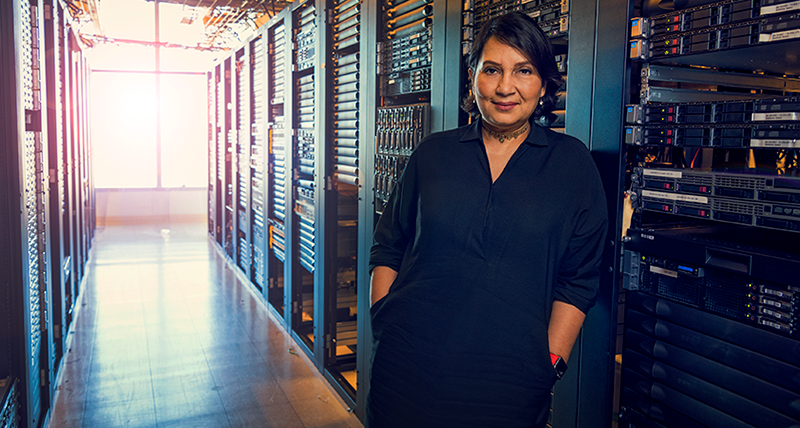 woman standing in hallway of servers