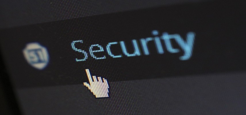 the word security on a computer screen with the pointer on it