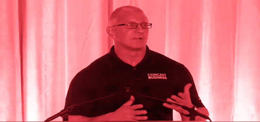 Robert Irvine talking, pink tint