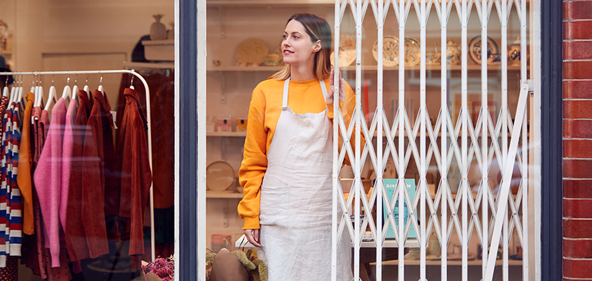 Woman Closing A Store