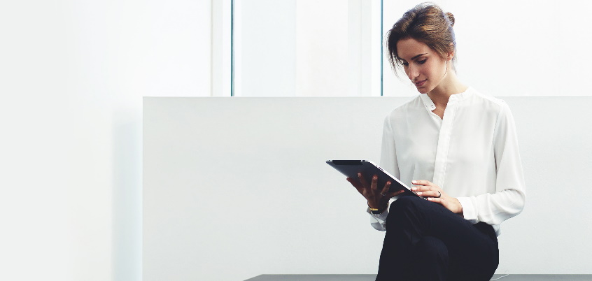 business woman looking at tablet