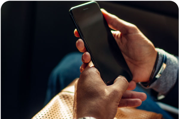 Hands holding smart phone